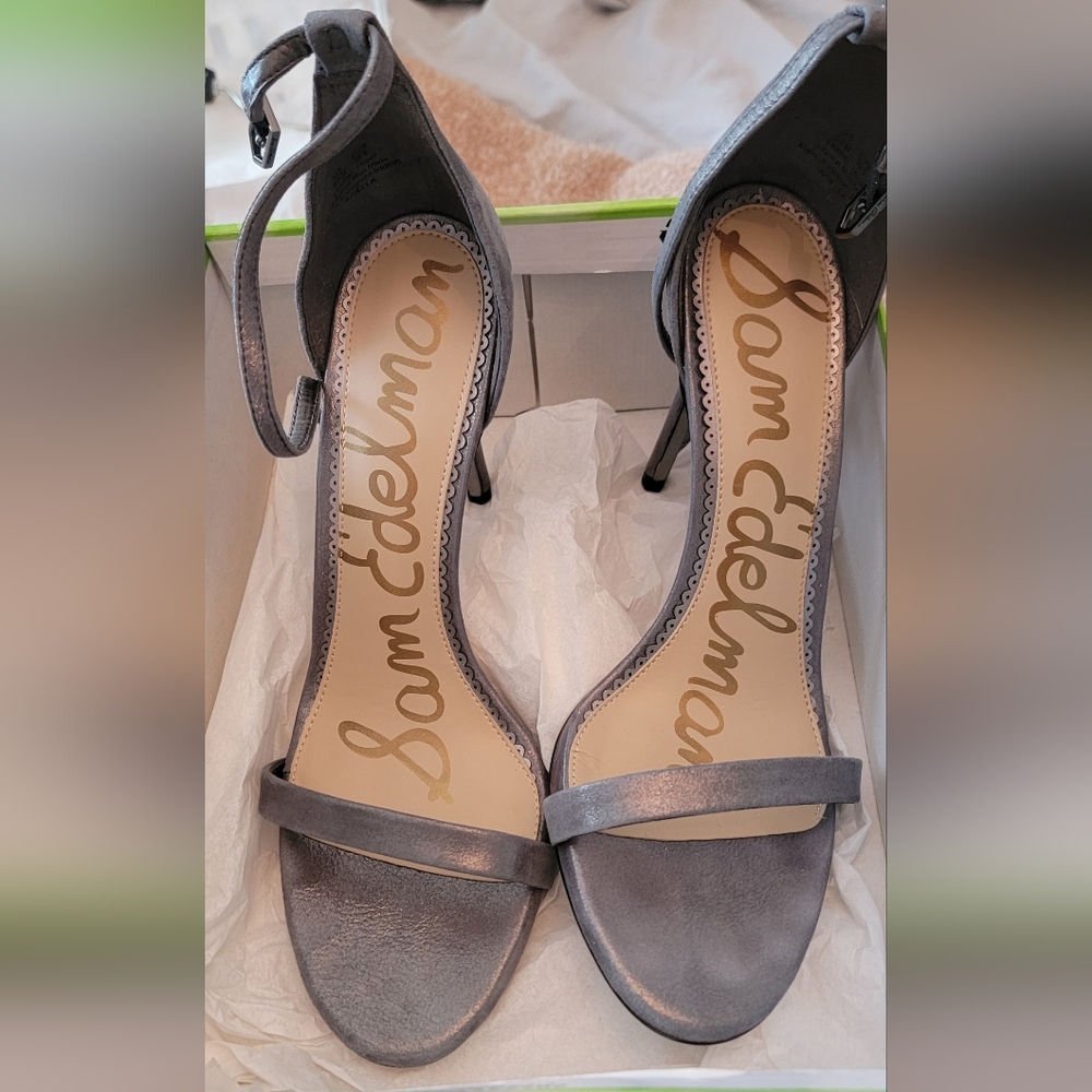 Pewter leather heeled sandals.